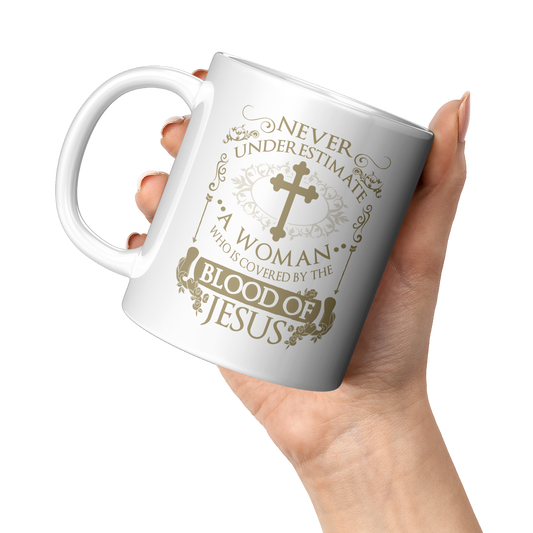 Covered_By_The_Blood_White_11oz_Mug_11oz_White_LH_Model_Mockup.png_3665248