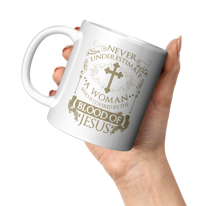 Covered_By_The_Blood_White_11oz_Mug_11oz_White_LH_Model_Mockup.png_3665248