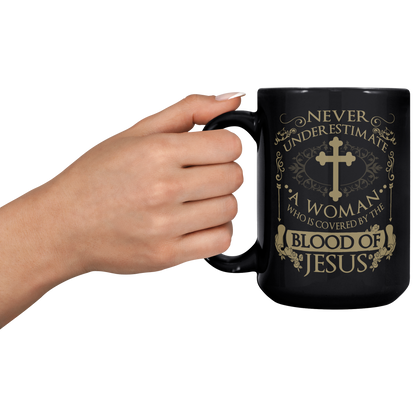 Covered__by_the_blood_15oz_15oz_Black_LH_Model_Mockup.png_15585328